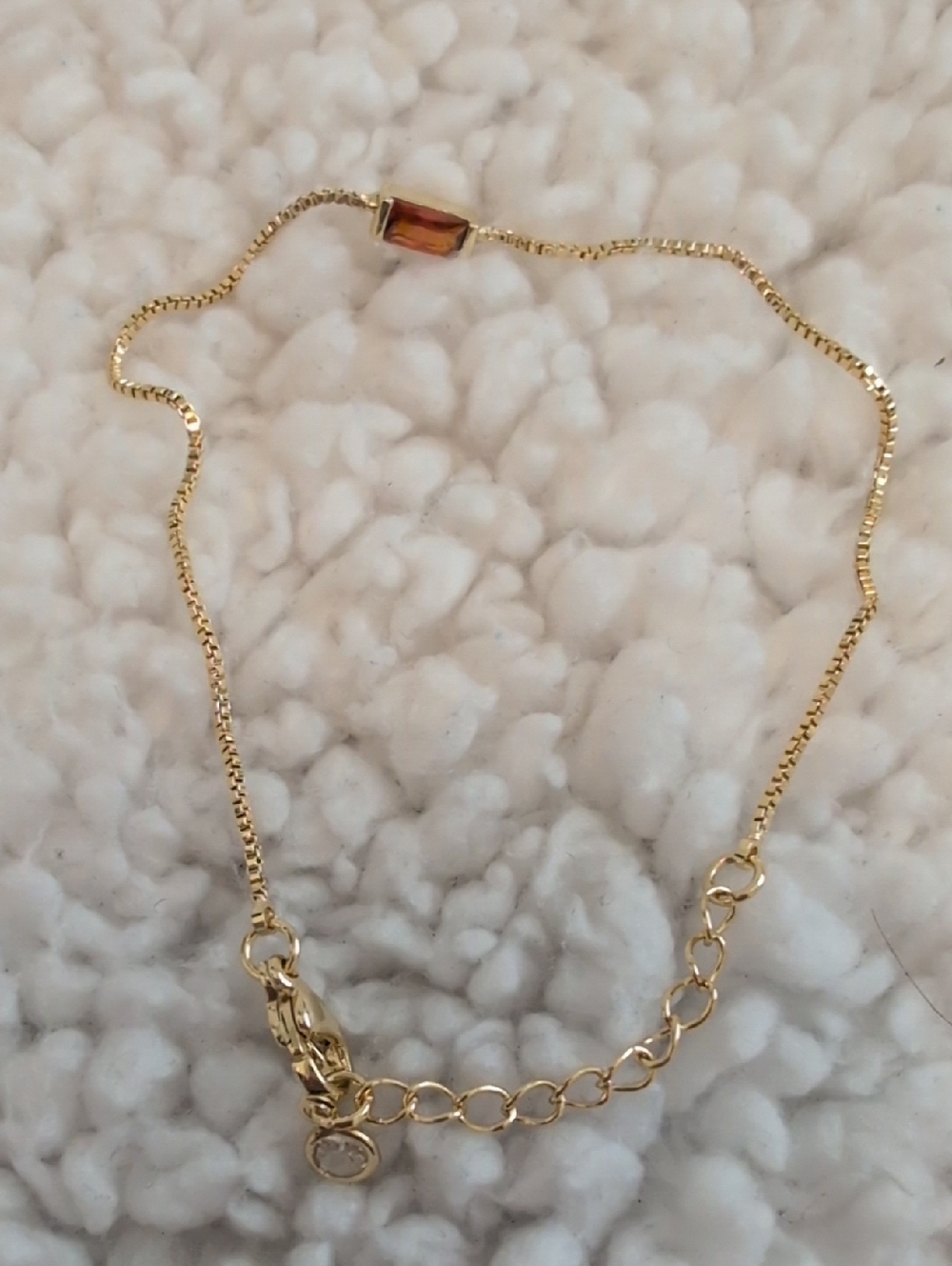 Gold Colored Chain Bracelet with Amber Accent